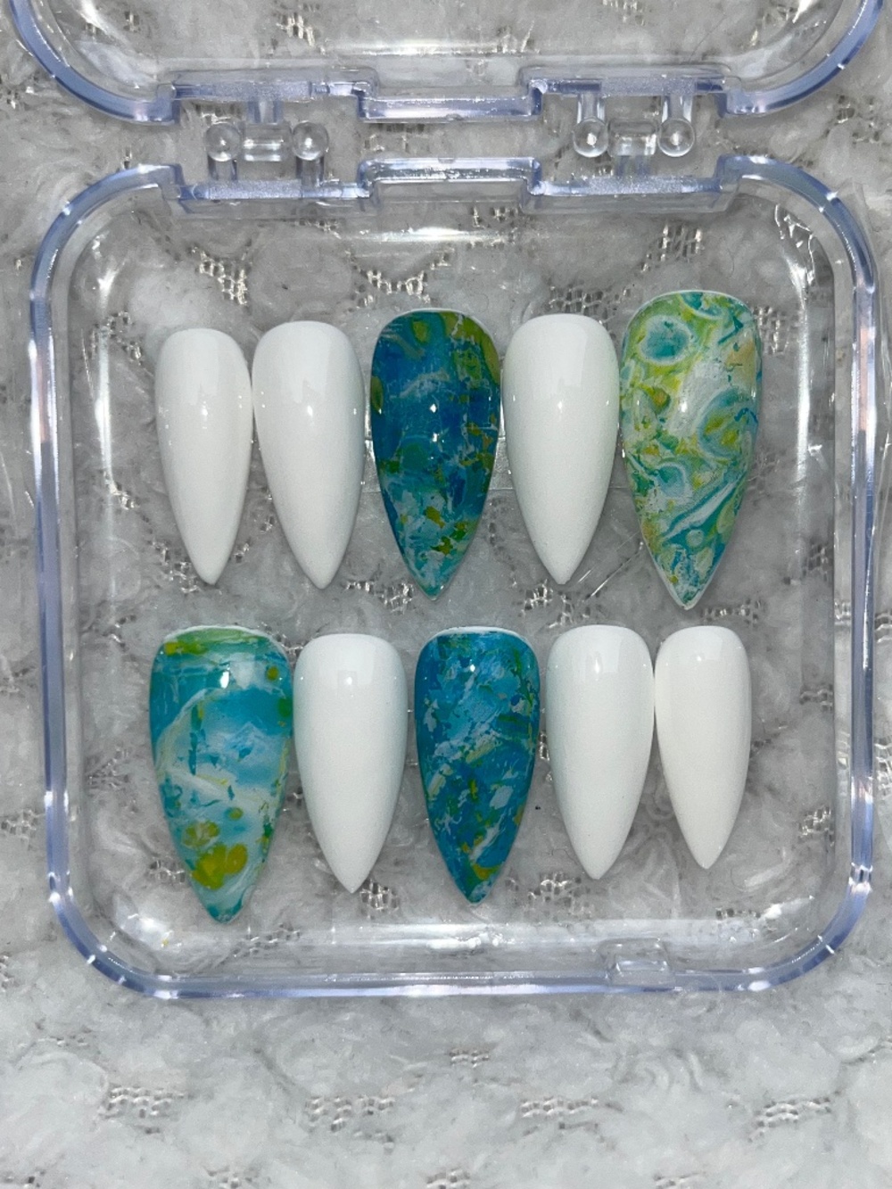 Handmade stiletto press on nails featuring shades of green, blue, white. Sz LG